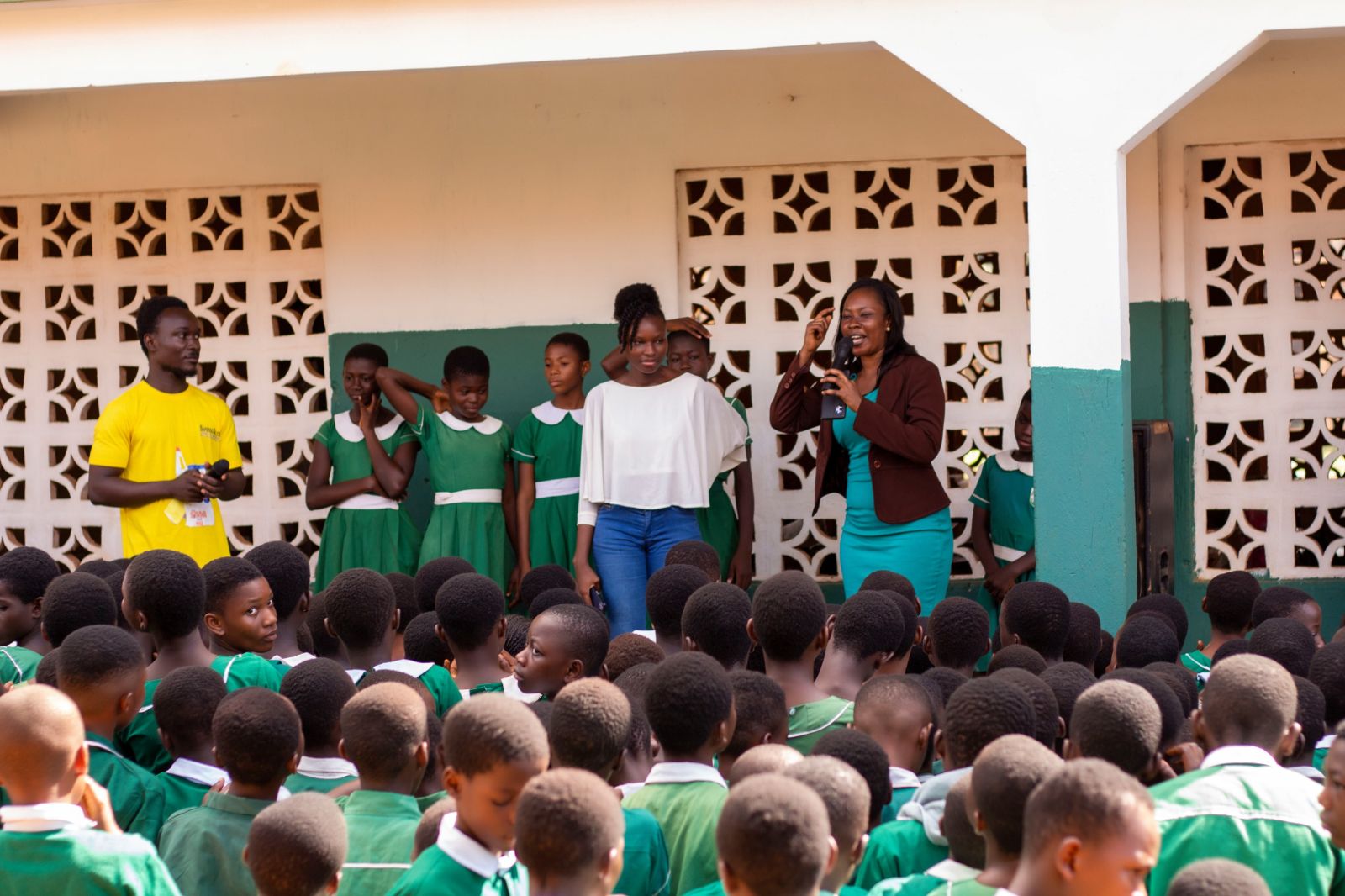 Safosco team speaking to students at a school outreach event
